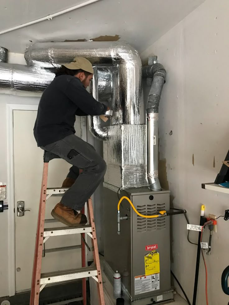 Technician repairing AC 2